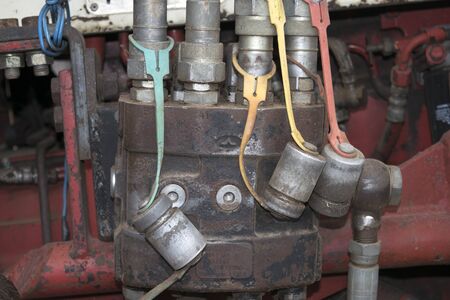 detail of a mechanism of the motor of an old tractor