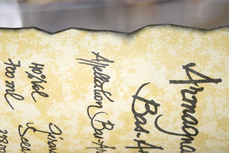 label of an aged armagnac with detail of the textの写真素材