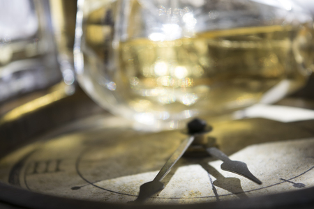 concept of time and glamour through an old clock  lights and atmosphere