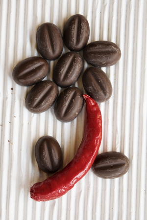 chilli pepper and chocolate in a graphic combinationの写真素材