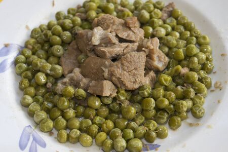 veal stew with peas and onionの写真素材