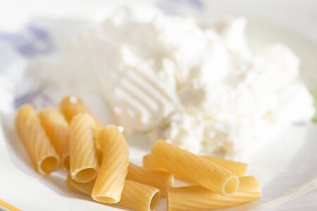 whole rigatoni pasta and fresh ricotta cheese