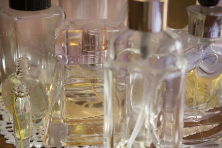 concept of beauty appeal and charm with some bottles of perfumesの写真素材