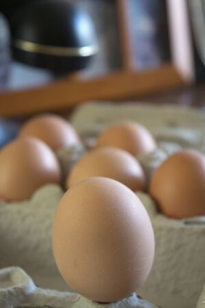 fresh and organic eggs on a wooden commode