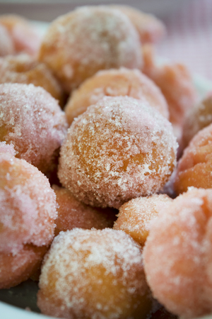castagnole are fried  sweet dough balls with icing sugar famaus In Italy as the dessert of Carnival.の写真素材