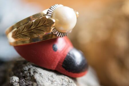 close up of a gold ring with pearl setの写真素材