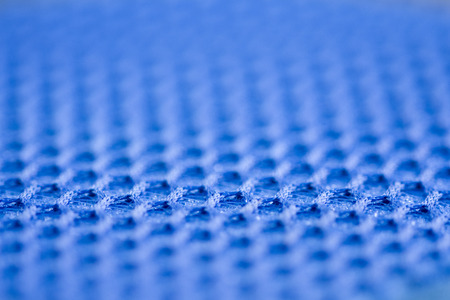 close up of blue dish washing sponge