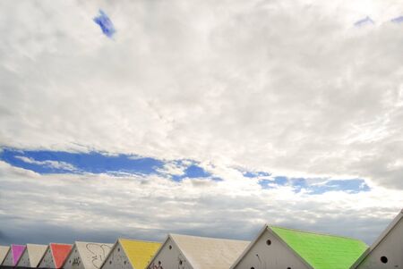 colored wooden roofs standing out against the sky
