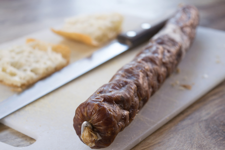 flat bread filling with salamiの写真素材