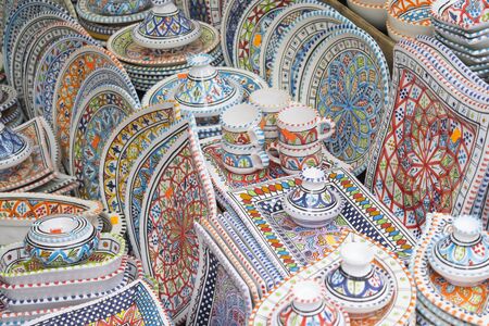 multi-coloured potteries exposed in a shopの写真素材