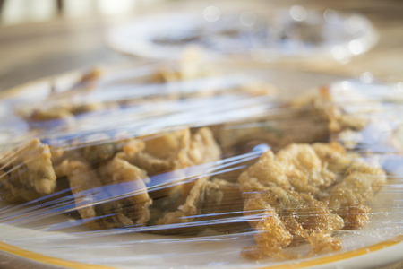 fritters of anchovies  wrapped in cellophane filmの写真素材