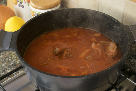 cooking beef goulash with sausagesの写真素材