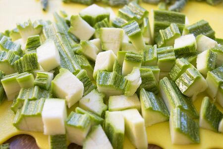  zucchini clipped in chunks as ingredient for seasoning of the pasta の写真素材
