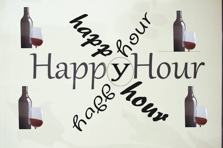 Advertisement sign of a happy hourの写真素材