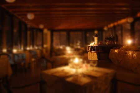 set tables of an elegant restaurant by candlelightのeditorial素材