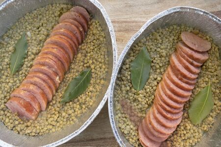 sliced cotechino with lentils tipycal Italian christmas dishの写真素材