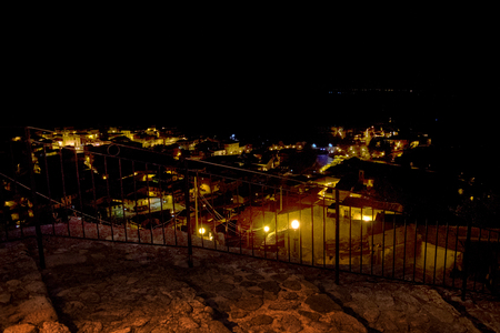 night view of an alley in the historical centre of an ancient villageの写真素材