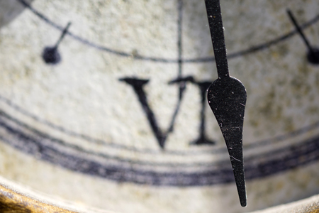concept of time with the detail of a roman number of a clock-faceの写真素材