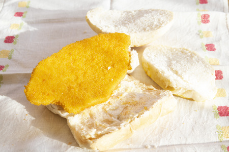 fried breaded chicken cutlet to prepare a sandwichの写真素材