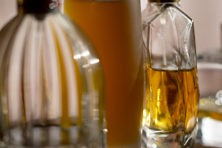 detail of an elegant perfume bottle in a romantic settingの写真素材