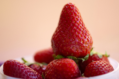 ripe strawberries isolated on neutral backgroundの写真素材