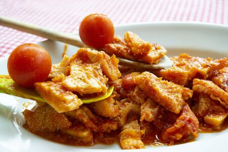 trippa alla romana or roman style tripe with fresh tomatoes and pecorino cheese