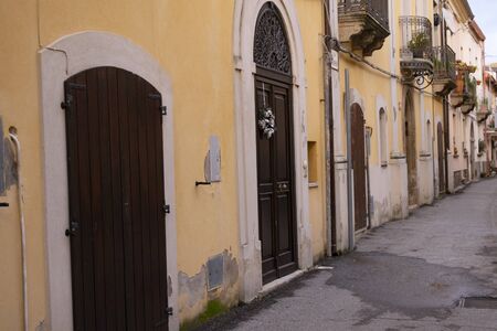 ancient village street with low housesの写真素材