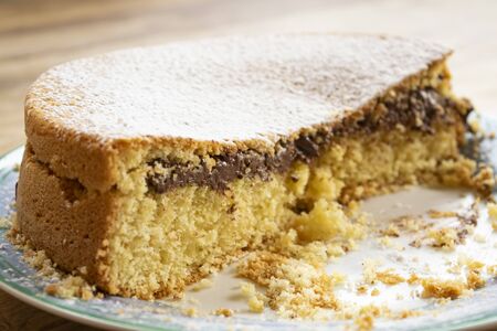 sponge cake filled with melted chocolate made at homeの写真素材