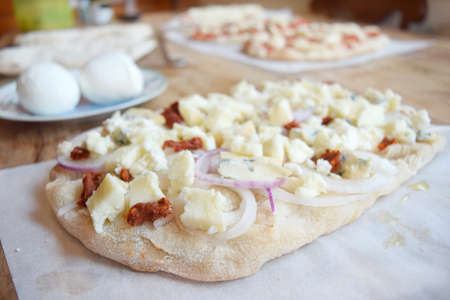 pizza with nduja tropea onion and mozzarella