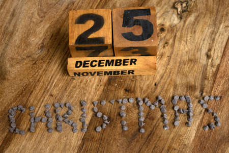 concept of christmas written with chocolate chipsの写真素材