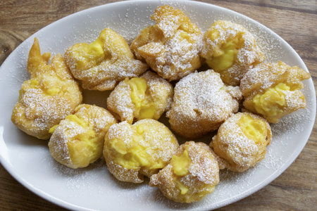 homemade puffs filled with custard or chantilly cream
