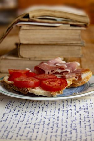 concept of concentration and fast snack while reading and writingの写真素材