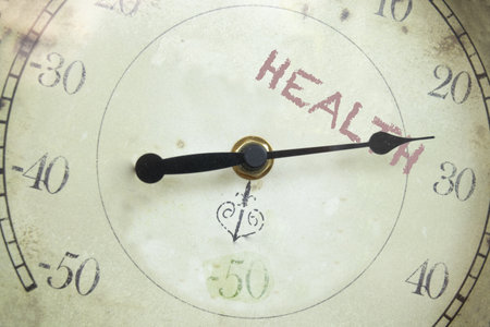 health concept with the inscription on an old thermometerの写真素材
