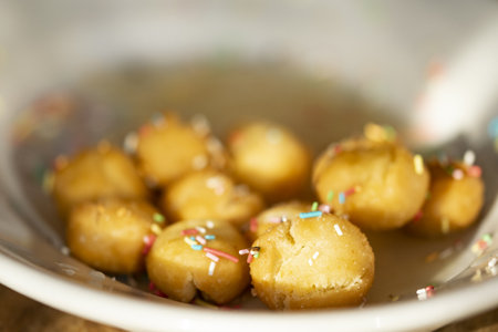 typical neapolitan sweet struffoli with honeyの写真素材