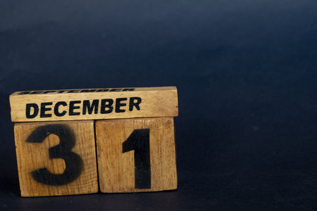 end of year concept with the date shown on the wooden cubesの写真素材