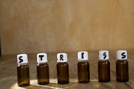 stress cure concept with the word stress written on medicine bottle capsの写真素材