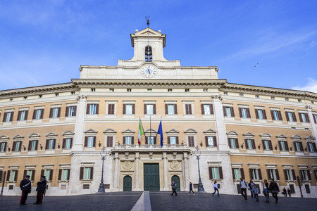 Rome, November 17, 2013: A group of tourists walking in Piazza Montecitorio, where is located the seat of the Italian Parliament. November 17, 2013, Rome, Italyのeditorial素材
