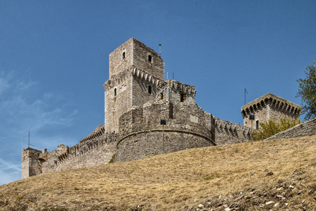 View of the Rocca Maggiore overlooking the city historic Assisi, Umbria, Italyの写真素材