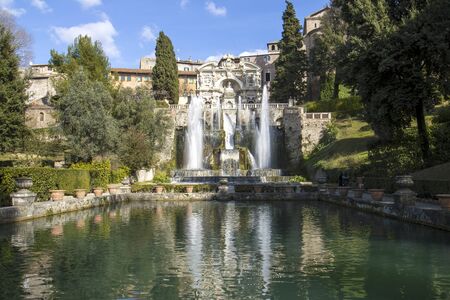 the fountain of neptune is the most impressive and scenic fountain of villa D'est? ?, for the large amount of water and the powerful spouts that project high splashes of water into the air.の写真素材