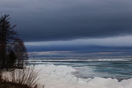 Baikal in April, rainy cloudy weatherの写真素材