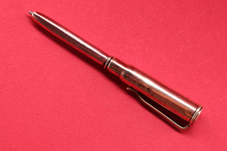 Ball-point pen made of cartridge cases and bullets from WWII timesの写真素材