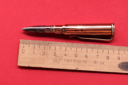 Ball-point pen made of cartridge cases and bullets from WWII timesの写真素材