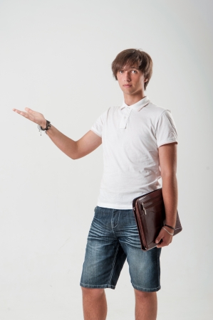 Young man with paper-caseの写真素材