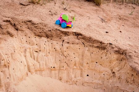 Toy dump-truck in the sands, summer, dayの写真素材