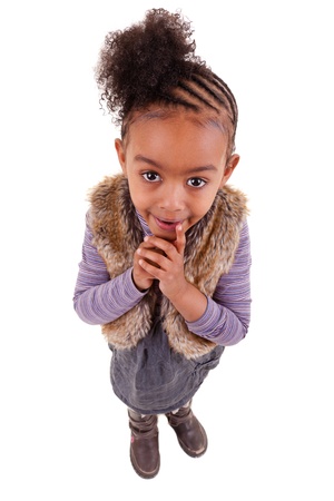cute little african american girl  looking upの写真素材