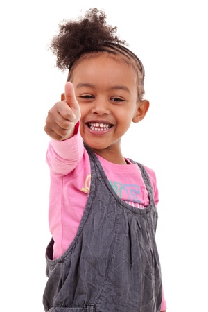 Cute little black girl making thumbs upの写真素材