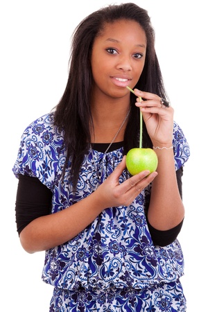 young black woman drinking apple juiceの写真素材