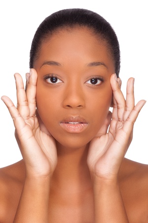 Portrait of a young beautiful african woman, Isolated over white backgroundの写真素材