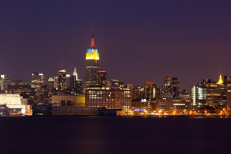 New York - view of Manhattan Skyline by night from  Brooklynの写真素材