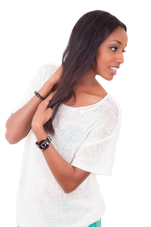 Portrait of a beautiful young black woman , isolated on white backgroundの写真素材